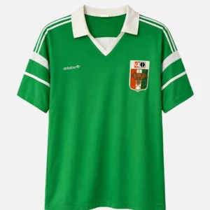 Elfenbenskystens grønne matchworn hjemmetrøje fra 1985 med elefant-badge og Adidas-logo – nummer 12 Zahui i størrelse L